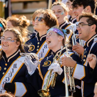 A picture of Blugold marching band with cheerful energy